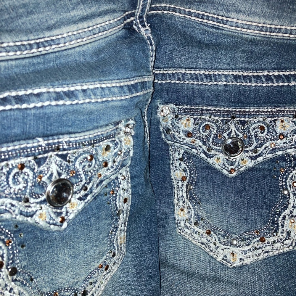 Size 4 never worn bootcut pocket bedazzled blue jeans